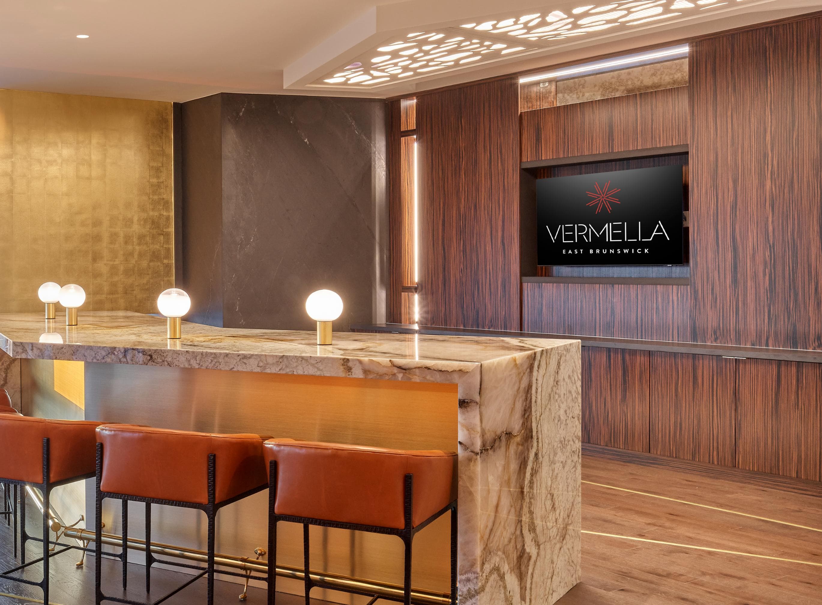 A bar area with a sign that says