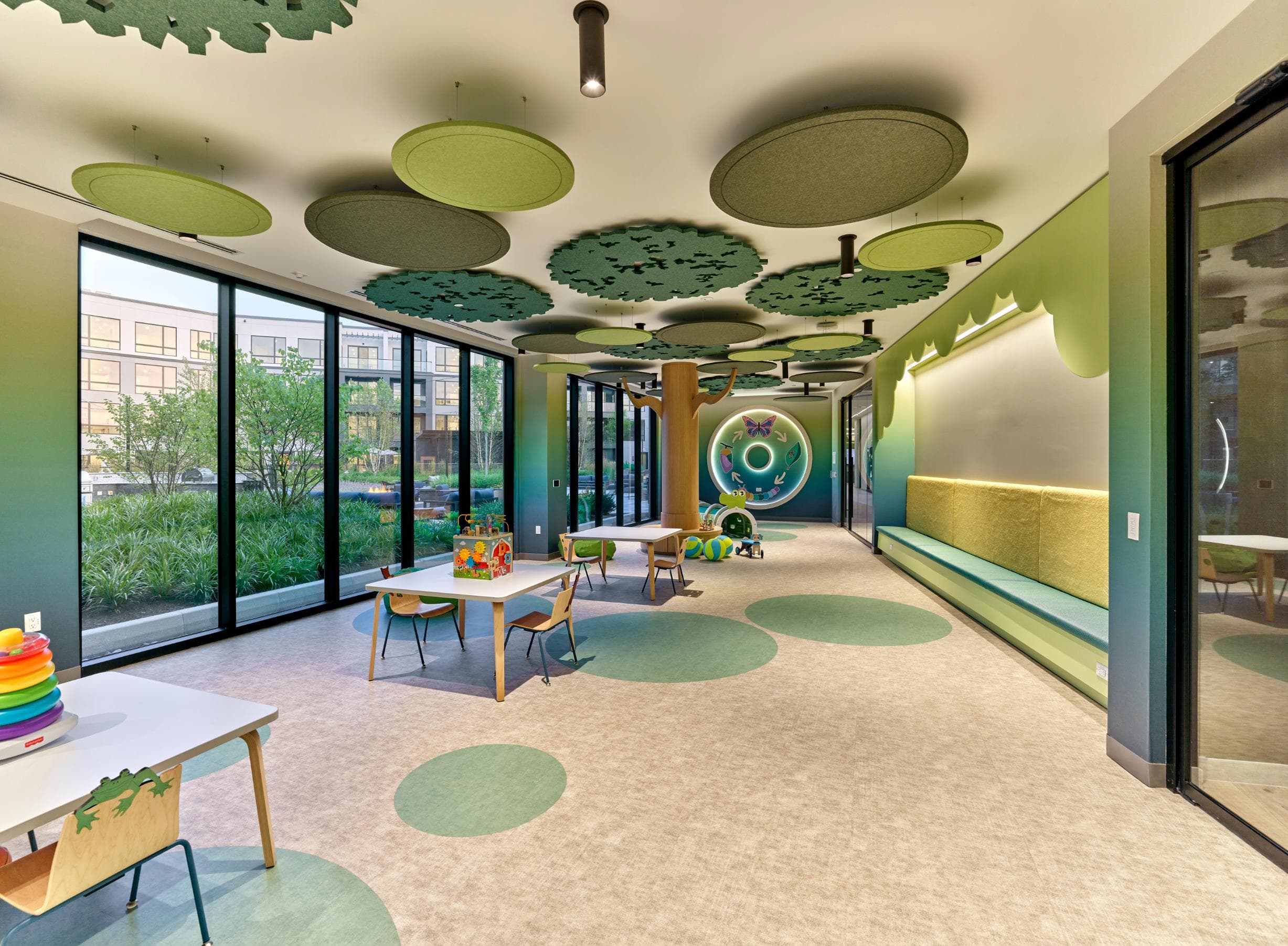 A room with a green ceiling and a white table.